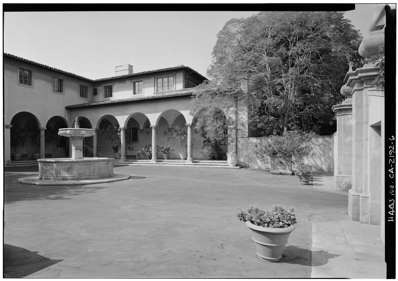 Archival photograph: the arcaded court and fountain of the Harold Lloyd Estate, Beverly Hills
